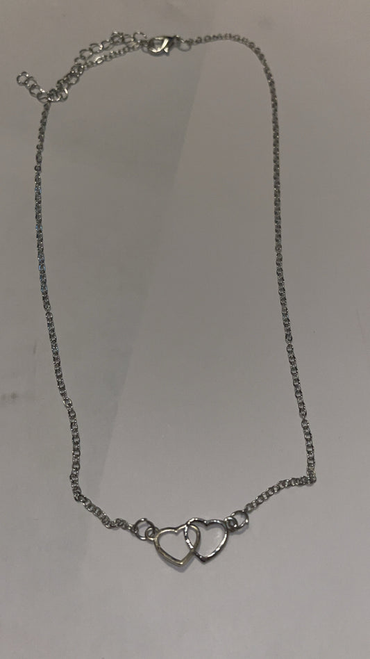 Silver necklace: 2 open hearts