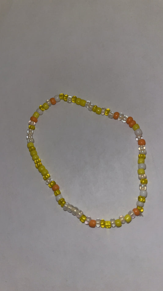 Yellow and orange beaded bracelet