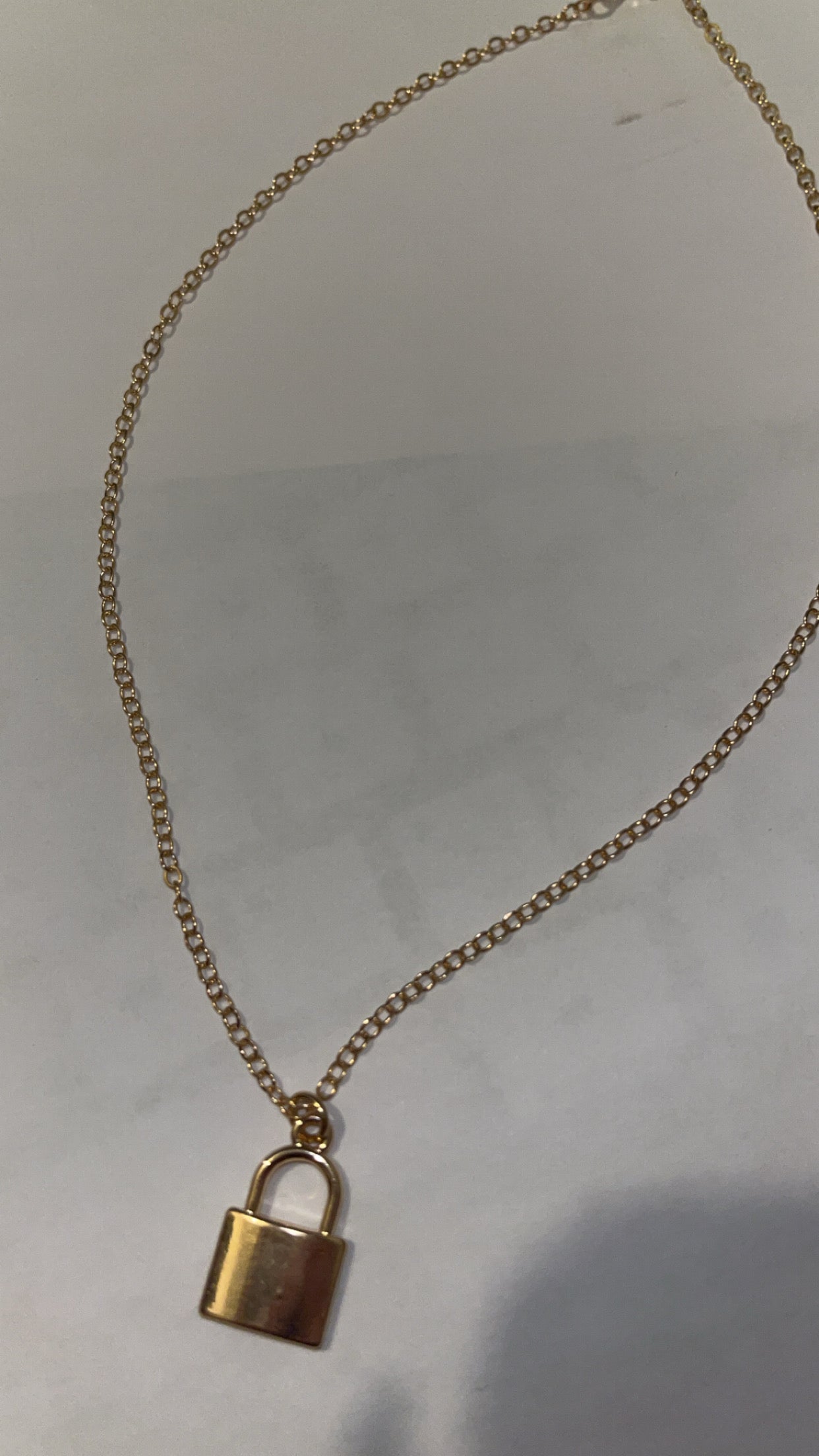 Gold necklace: lock