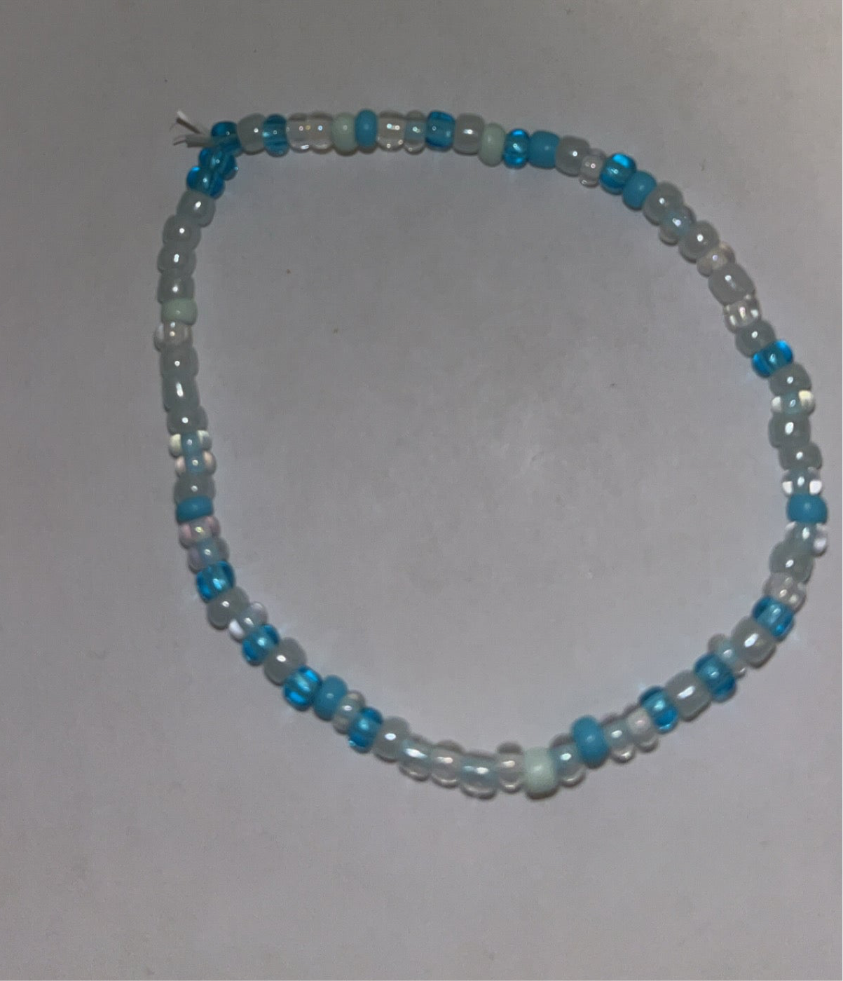 Beaded bracelet: Light blue, Clear, Grey and White