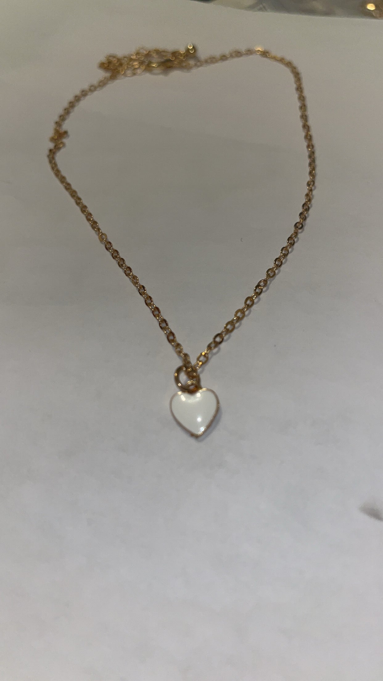 Gold necklace: White Heart