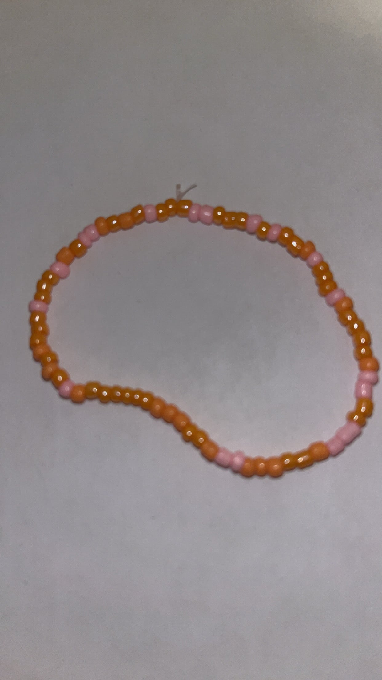 Orange and pink beaded bracelet